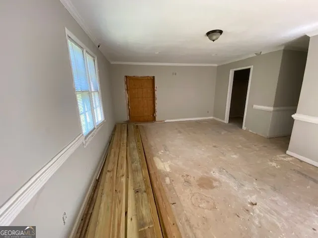 a view of gallery with wooden floor