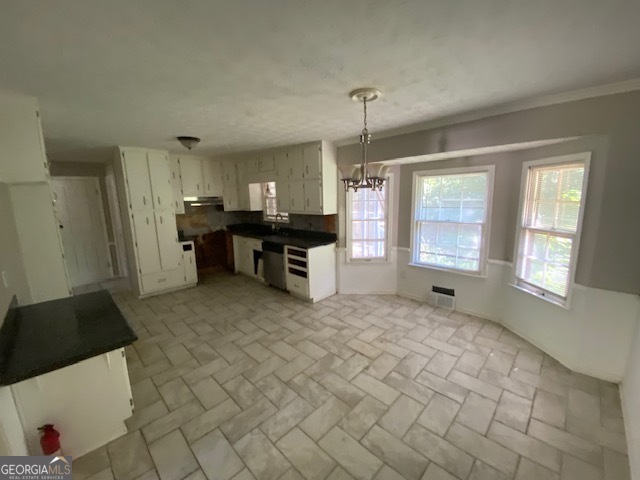 203 Farmbrook Parkway Stockbridge, GA 30281 - Photo 7 of 25 a view of a kitchen with furniture and a window