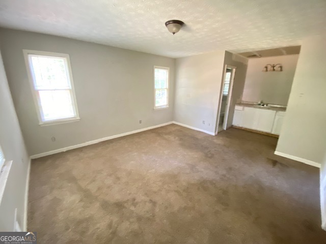 203 Farmbrook Parkway Stockbridge, GA 30281 - Photo 10 of 25 a view of an empty room with a window