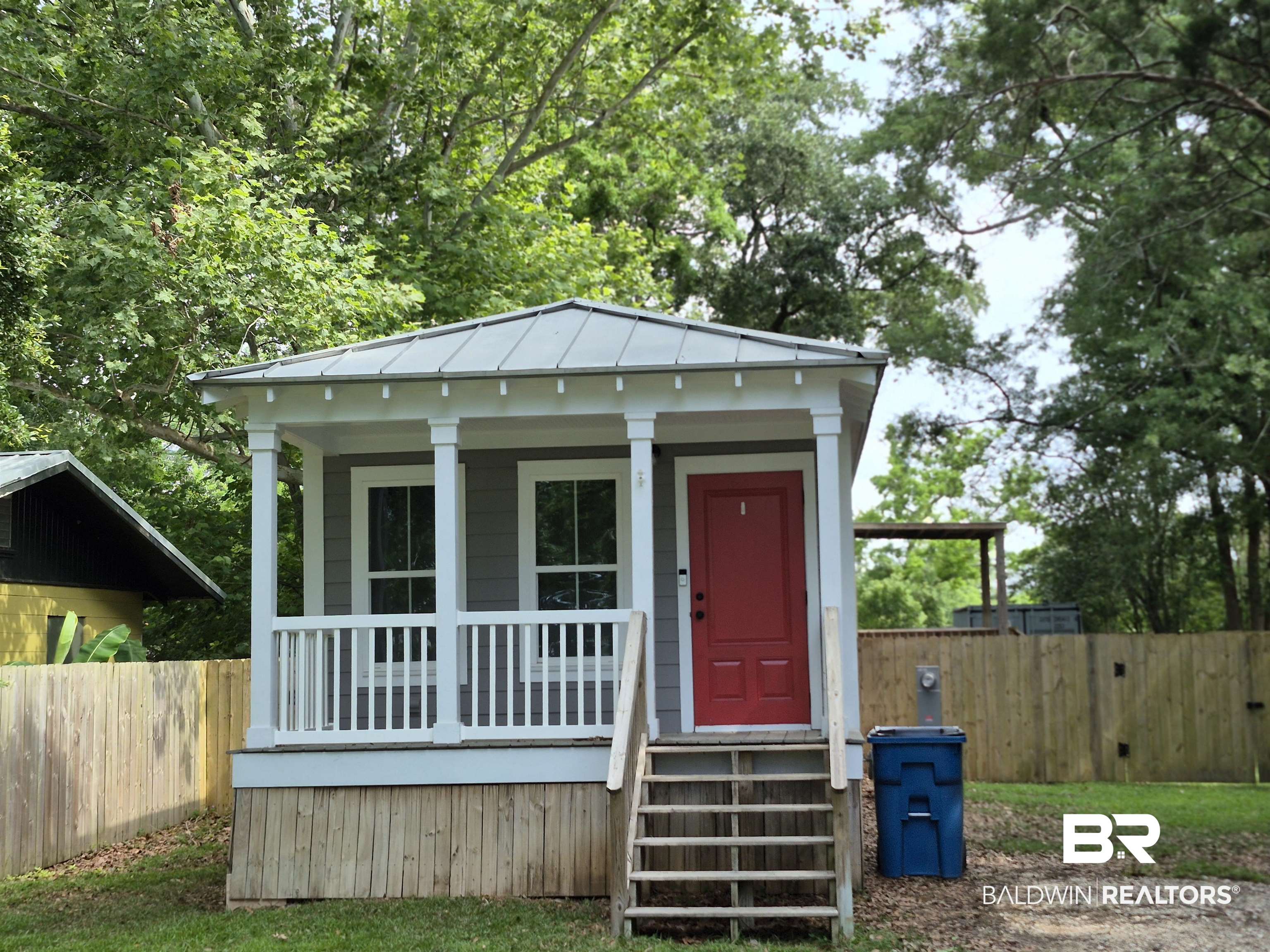 24681 Olive Street Elberta, AL 36530 - Photo 3 of 22 View of front of property featuring metal roof and a standing seam roof
