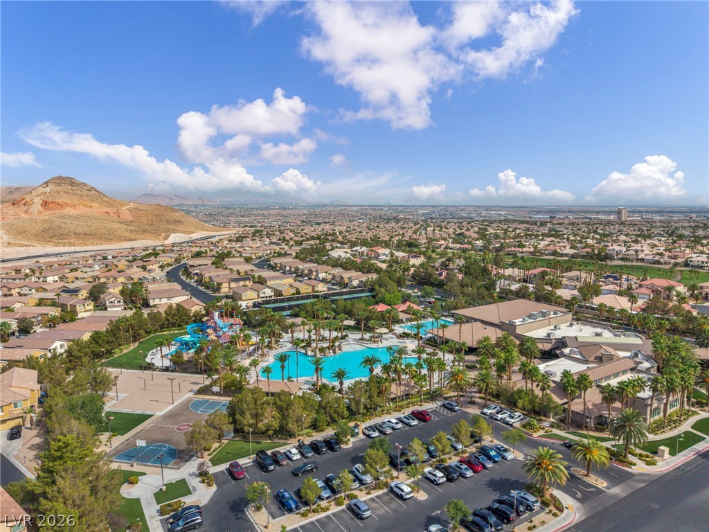 389 Fringe Ruff Drive Las Vegas, NV 89148 - Photo 45 of 53 A vibrant neighborhood resort-style pool complex sits surrounded by majestic mountain views.