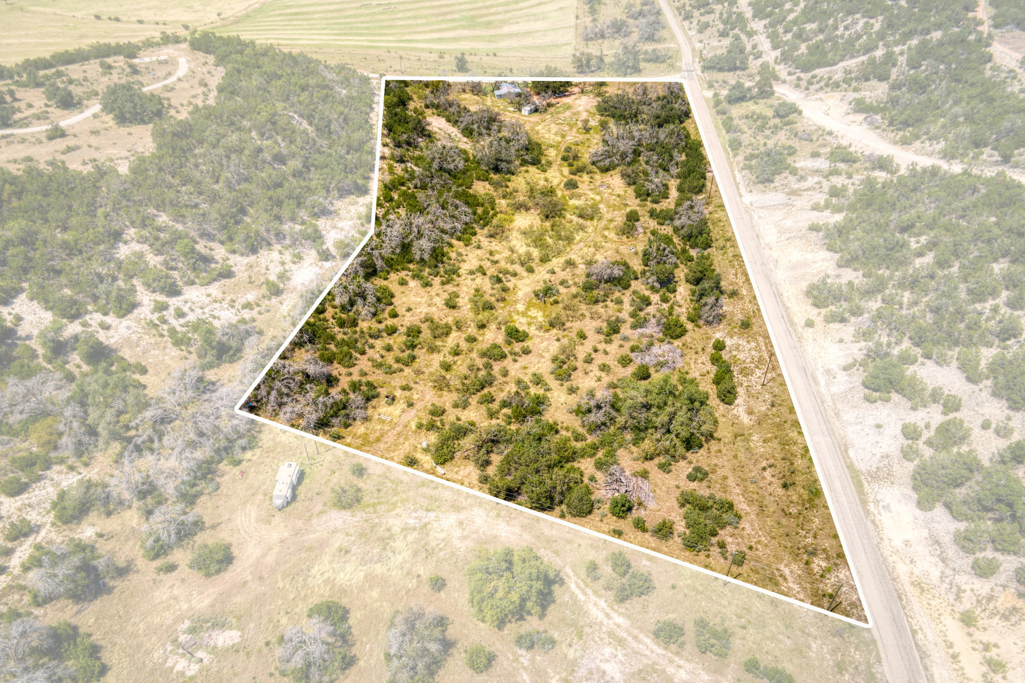 51 D S Road Fredericksburg, TX 78624 - Photo 17 of 19 Overview of rural landscape with property boundaries highlighted