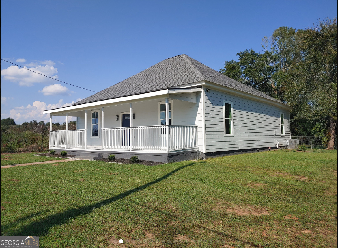 2 Cedar Avenue Griffin, GA 30223 - Photo 2 of 13 a front view of a house with a garden