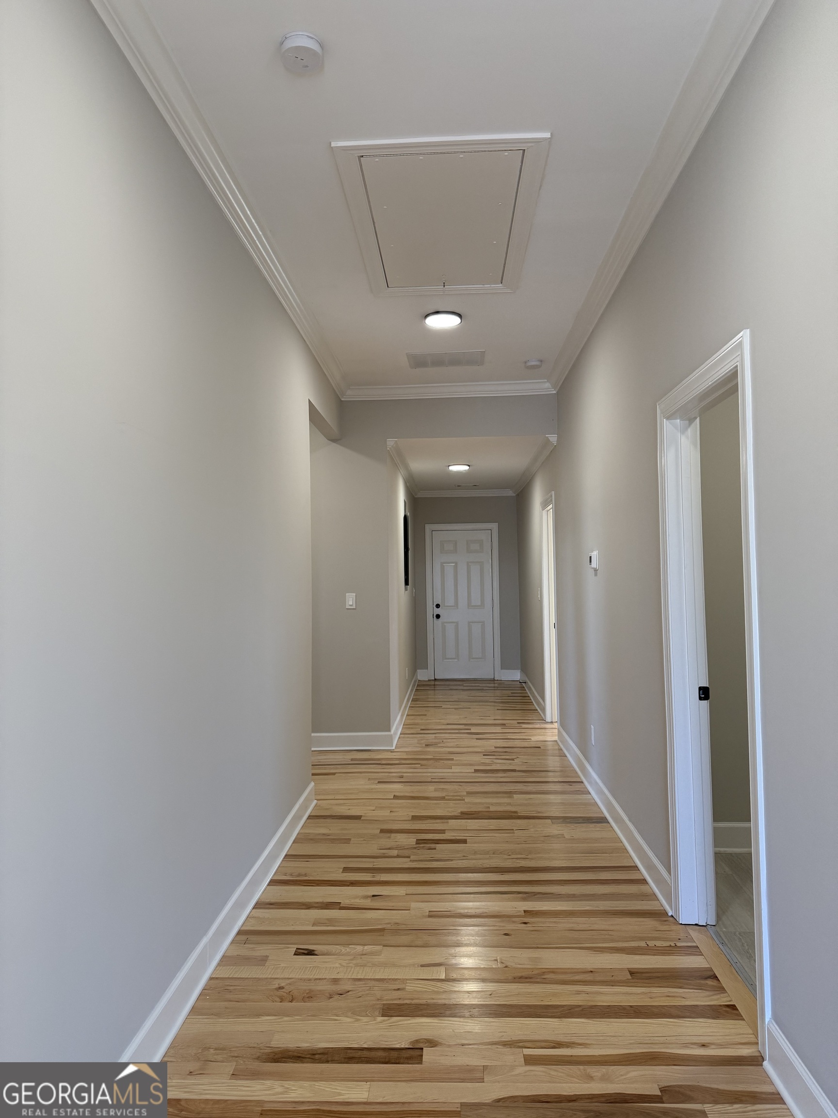 2 Cedar Avenue Griffin, GA 30223 - Photo 6 of 13 a view of a hallway with wooden floor