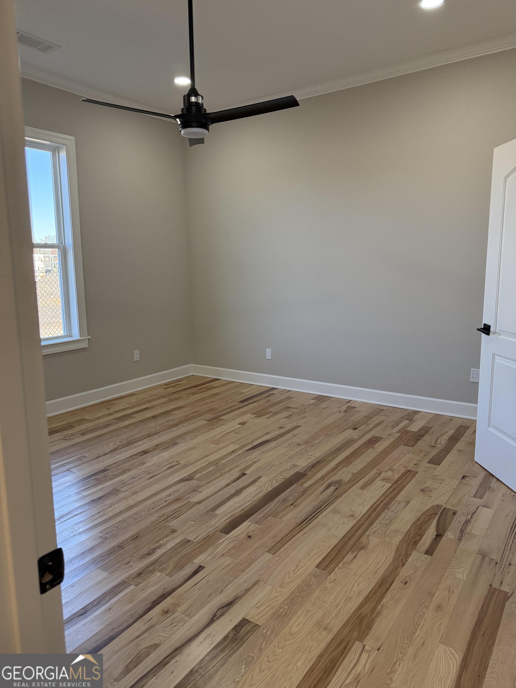 2 Cedar Avenue Griffin, GA 30223 - Photo 8 of 13 a view of a room with wooden floor and windows