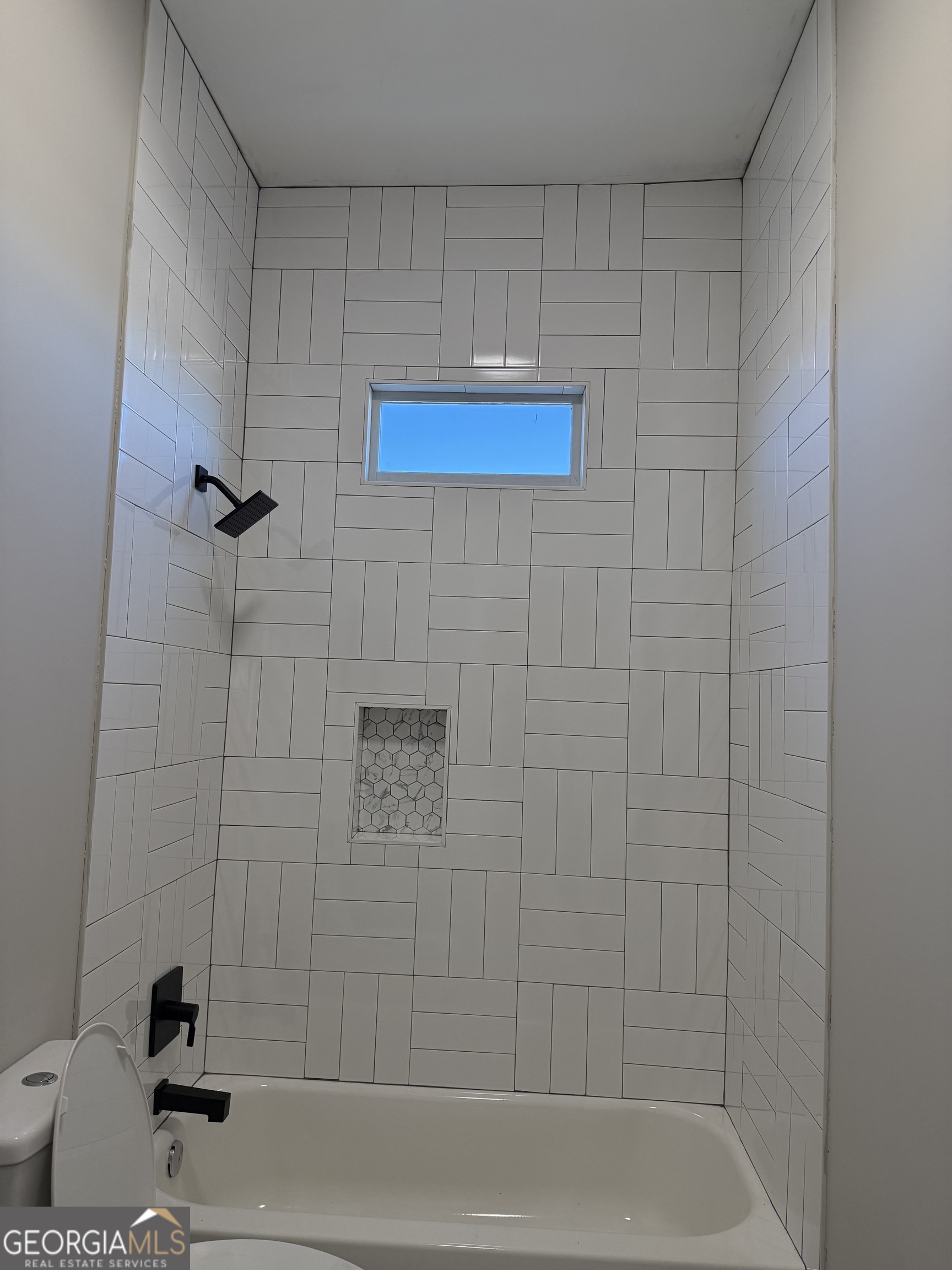 2 Cedar Avenue Griffin, GA 30223 - Photo 9 of 13 a bathroom with a shower