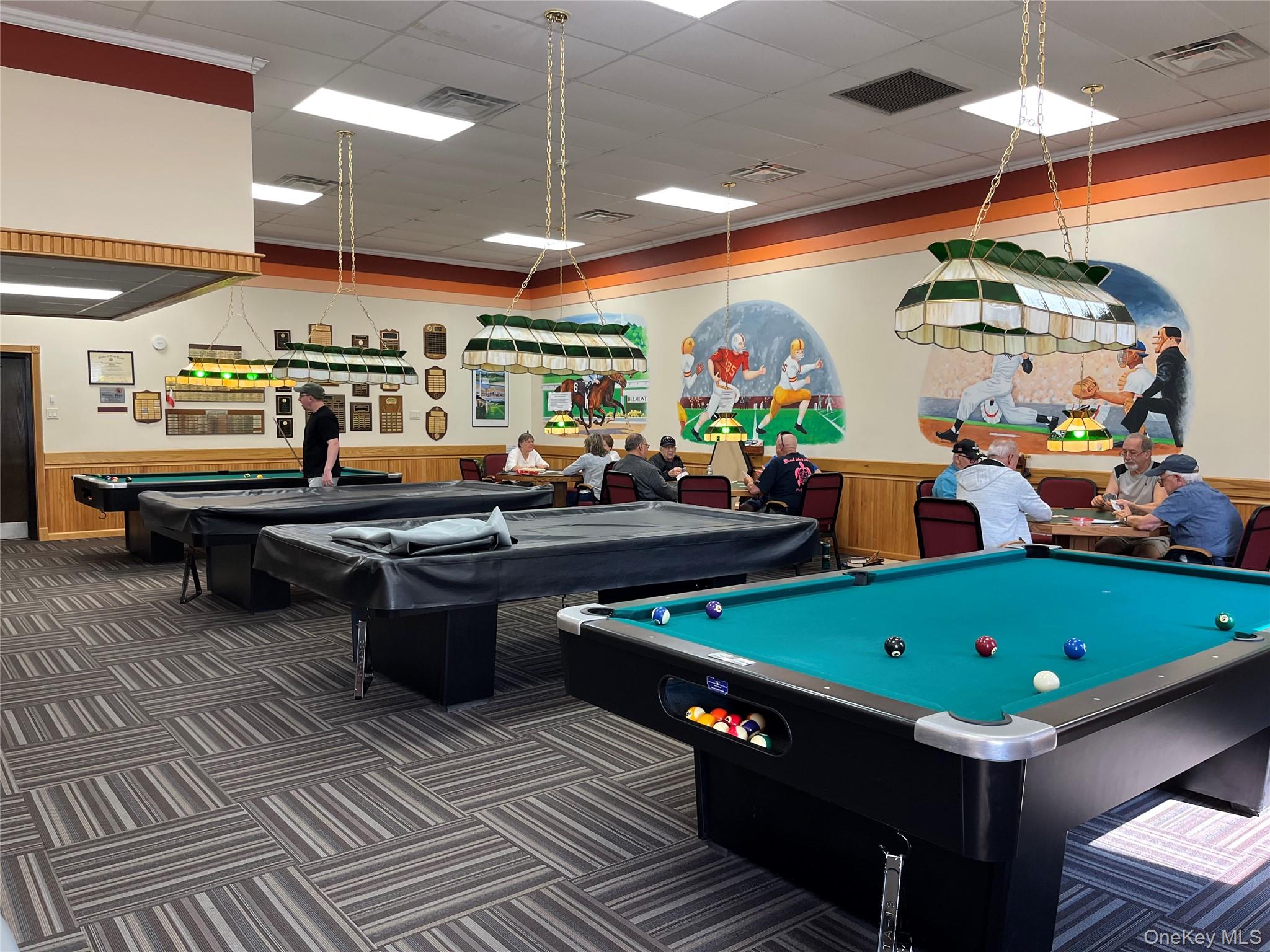 373 Woodbridge Drive, Unit B Ridge, NY 11961 - Photo 21 of 23 a room with lots of furniture and clutter