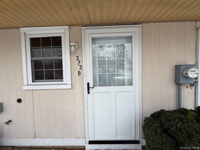 373 Woodbridge Drive, Unit B Ridge, NY 11961 - Photo 4 of 23 a view of front door