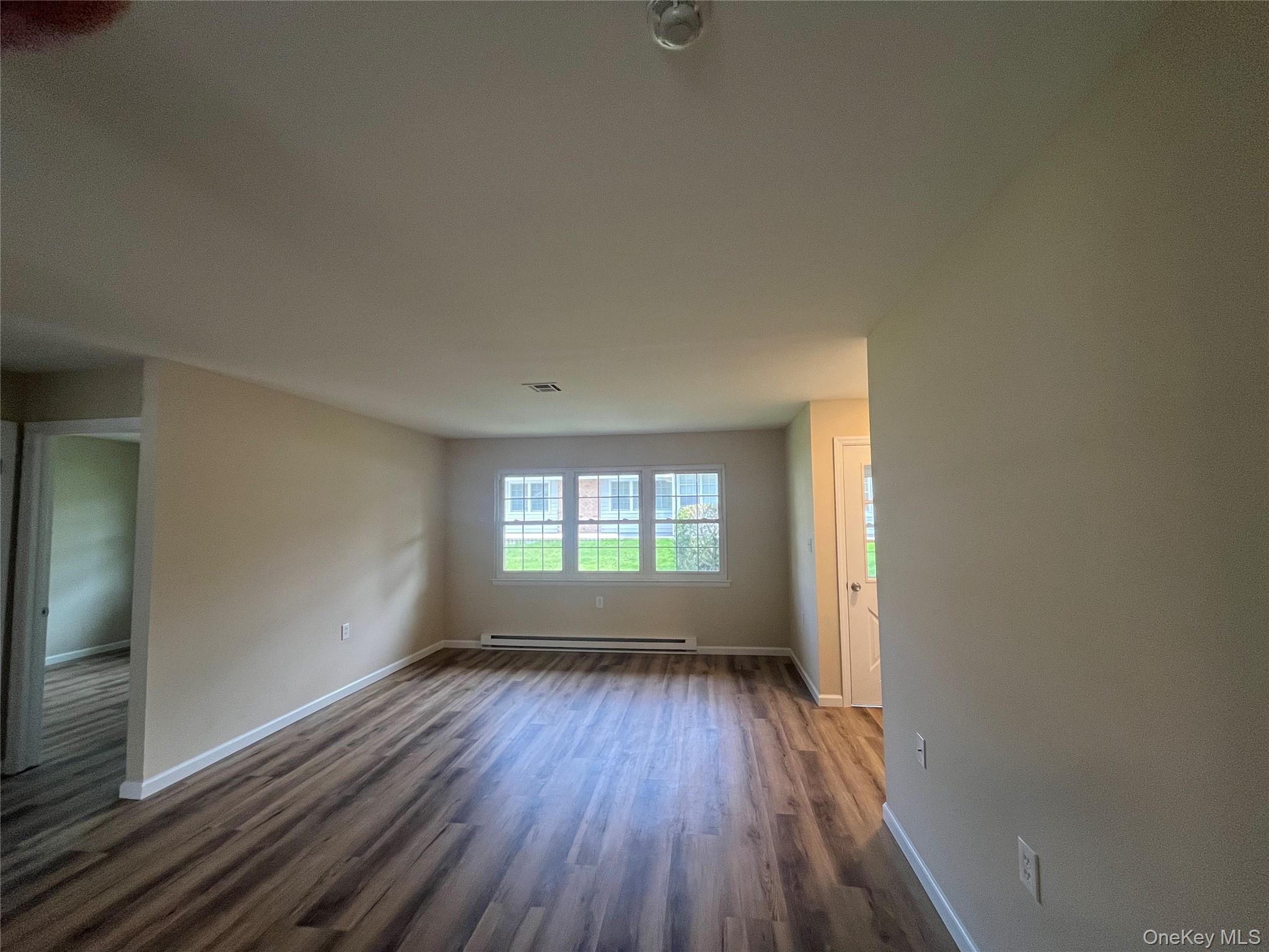 373 Woodbridge Drive, Unit B Ridge, NY 11961 - Photo 8 of 25 Spacious with new flooring