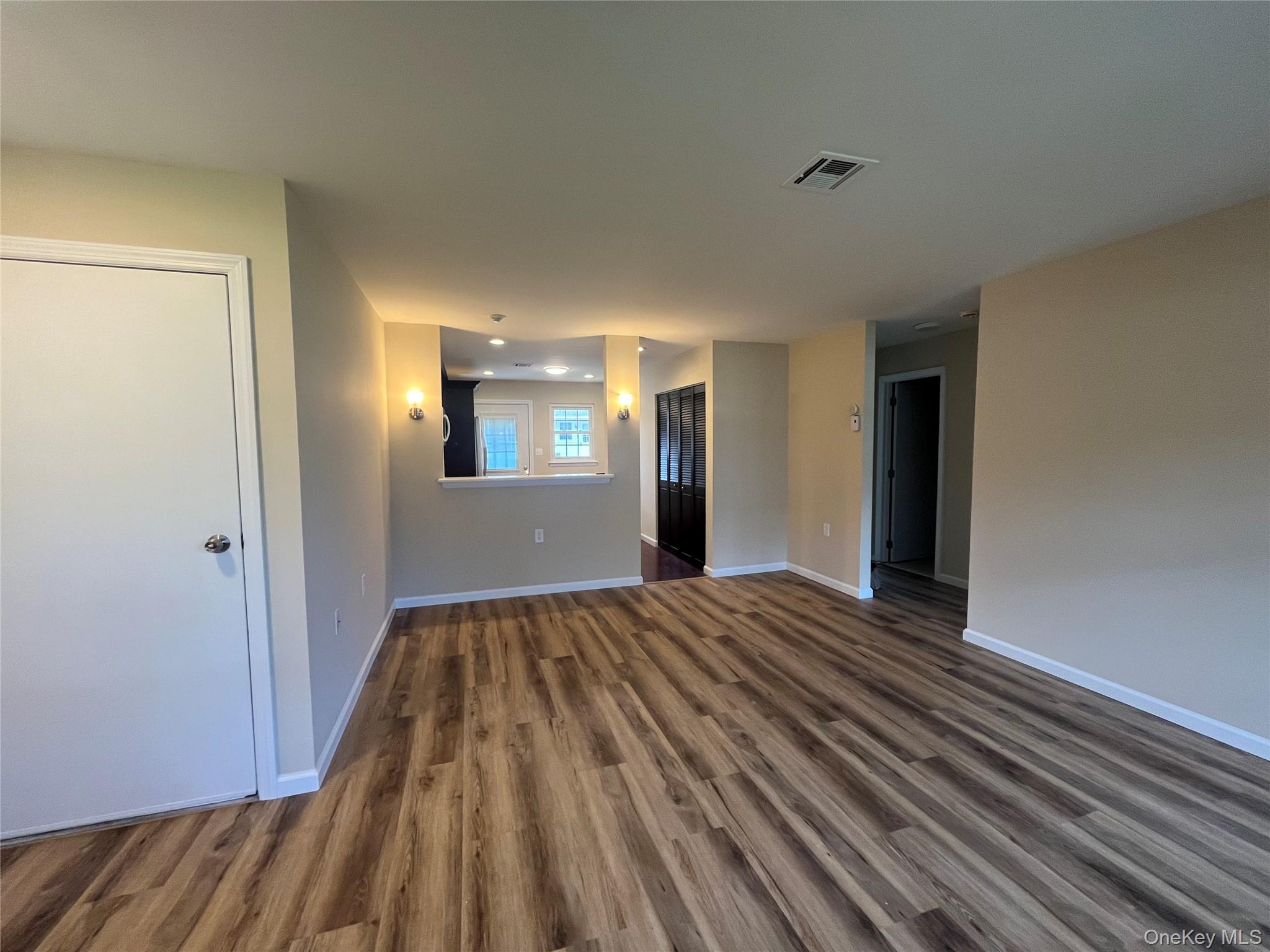 373 Woodbridge Drive, Unit B Ridge, NY 11961 - Photo 10 of 25 Living Room/Dining Room Combo