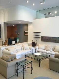 2226 Northwest 60th Street Boca Raton, FL 33496 - Photo 6 of 22 a living room with furniture and a table