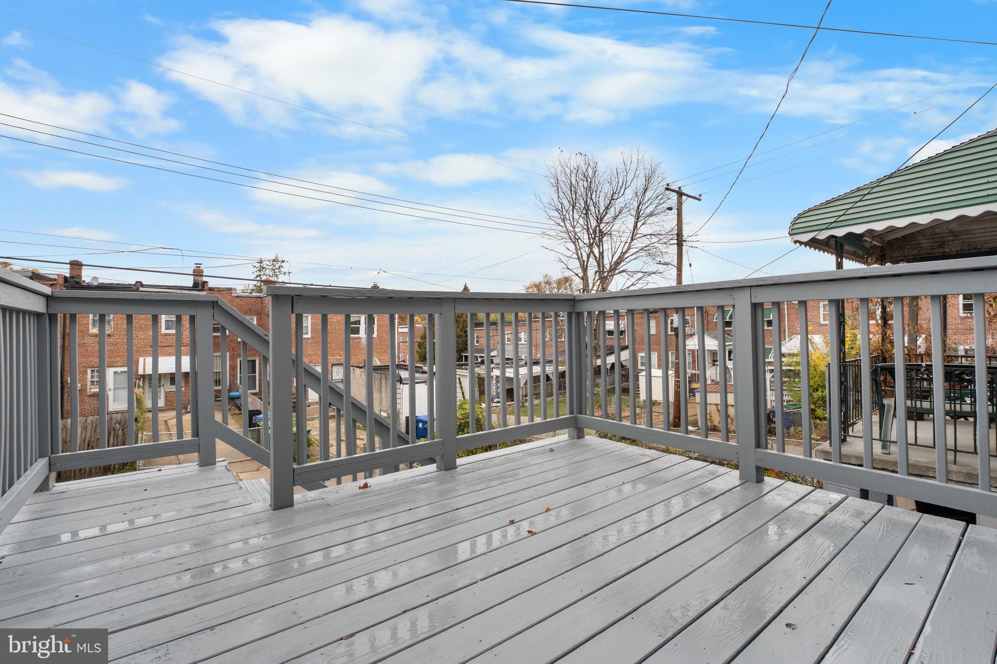 3904 Woodridge Road Baltimore, MD 21229 - Photo 16 of 17 a balcony with wooden floor
