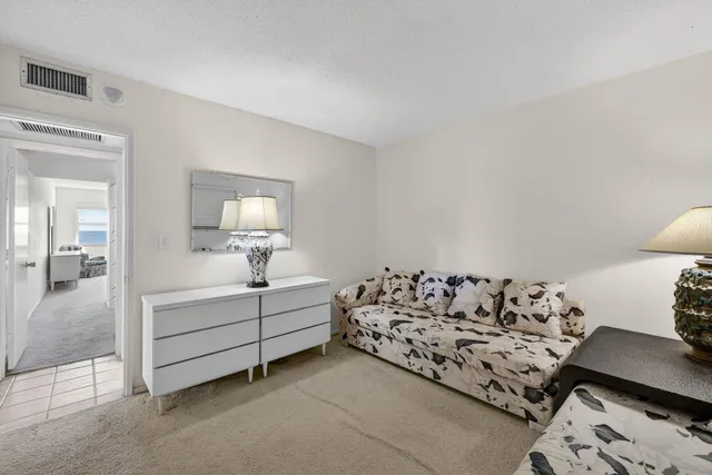 a bed room with white walls