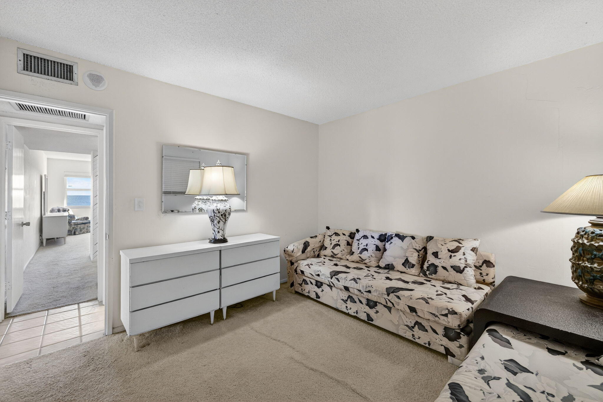 1069 Hillsboro Mile, Unit 802 Hillsboro Beach, FL 33062 - Photo 17 of 47 a bed room with white walls