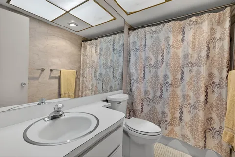 a bathroom with a sink and a toilet