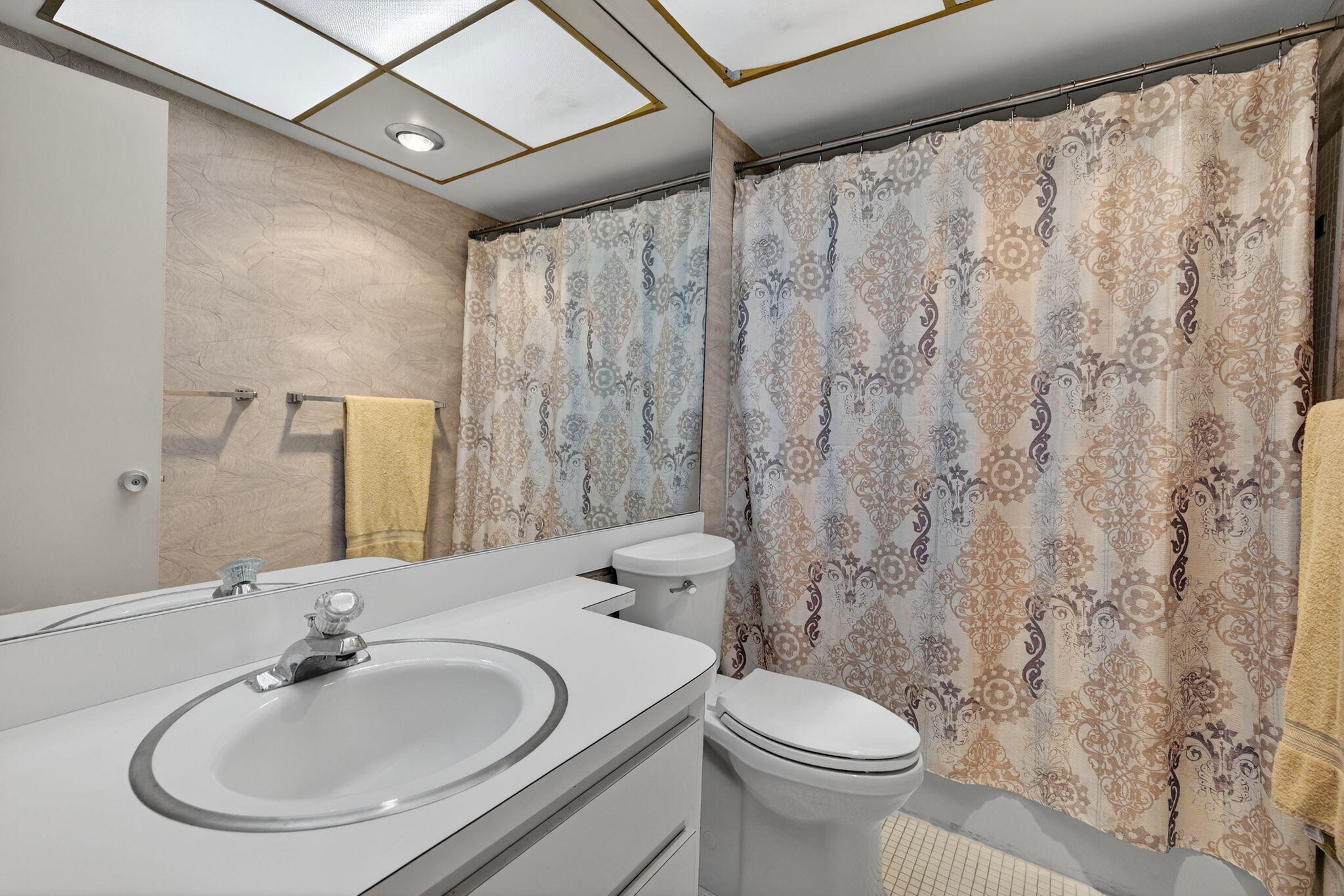 1069 Hillsboro Mile, Unit 802 Hillsboro Beach, FL 33062 - Photo 19 of 47 a bathroom with a sink and a toilet