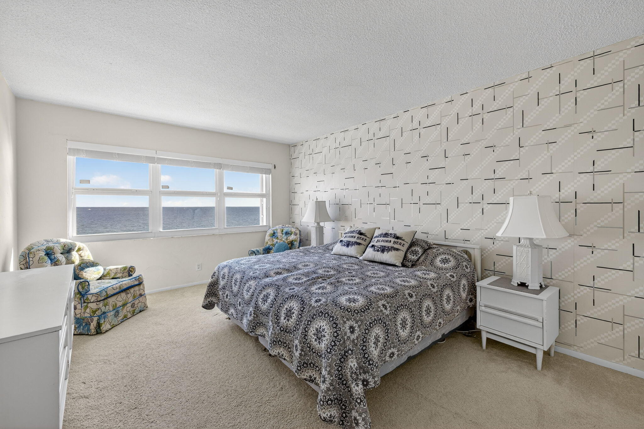 1069 Hillsboro Mile, Unit 802 Hillsboro Beach, FL 33062 - Photo 4 of 47 a bedroom with a bed and a window