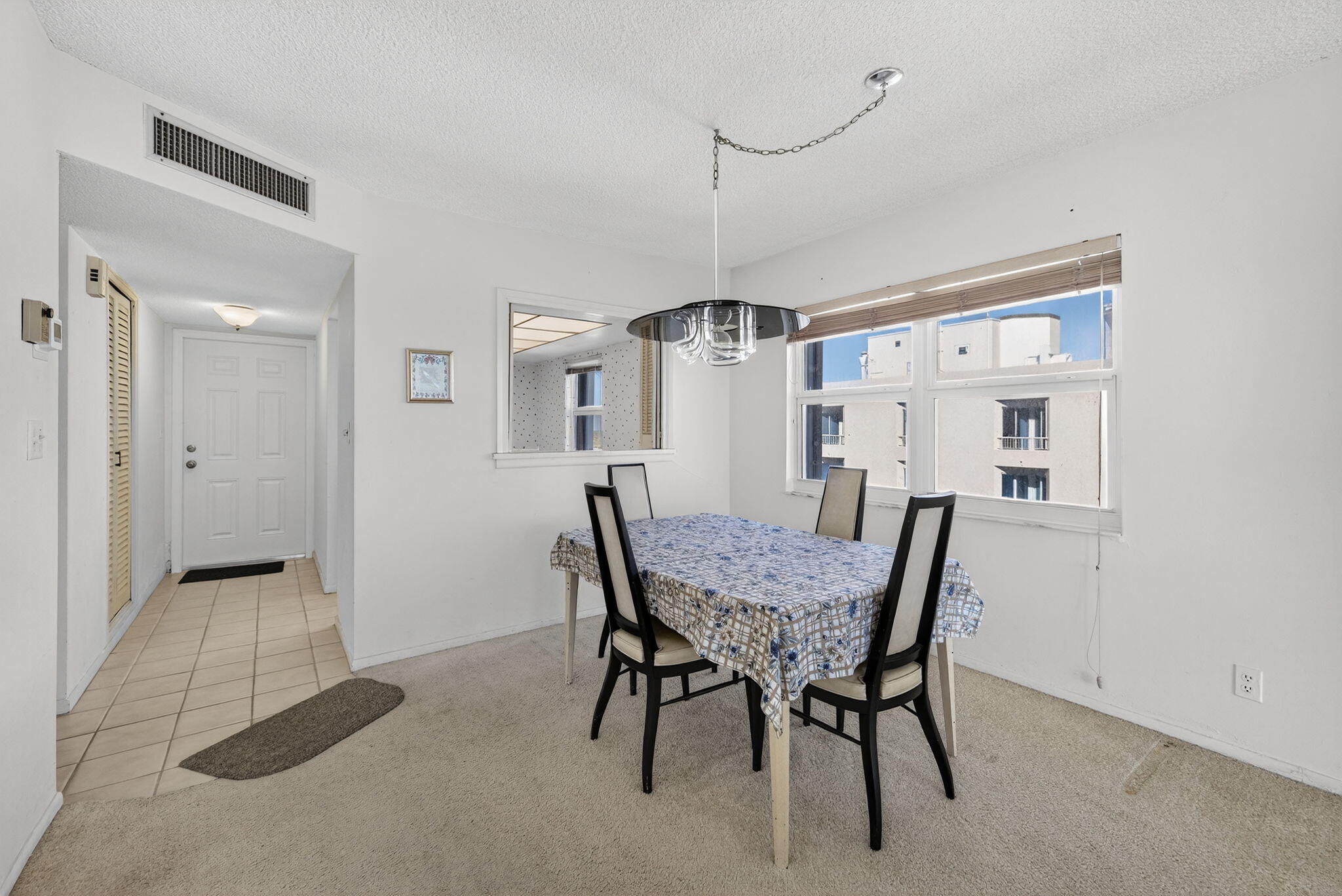 1069 Hillsboro Mile, Unit 802 Hillsboro Beach, FL 33062 - Photo 6 of 47 a view of a dining room with furniture