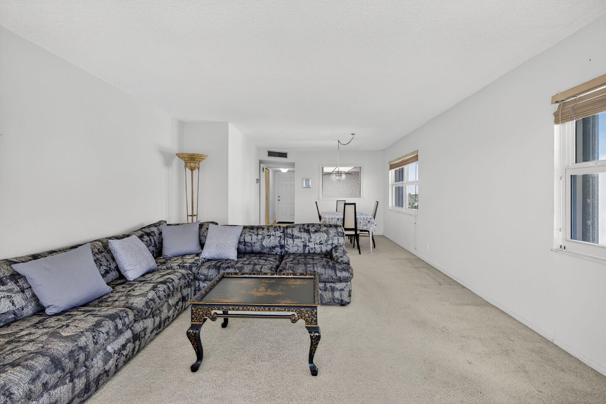 1069 Hillsboro Mile, Unit 802 Hillsboro Beach, FL 33062 - Photo 7 of 47 a living room with furniture and a wooden floor