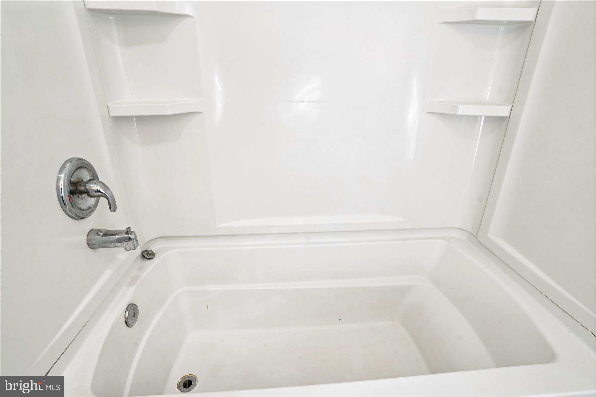 3831 8th Street North Beach, MD 20714 - Photo 22 of 37 a bathroom with a shower