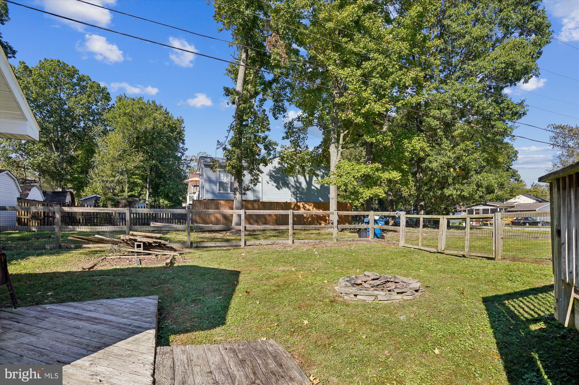 3831 8th Street North Beach, MD 20714 - Photo 27 of 37 a view of a swimming pool with a patio