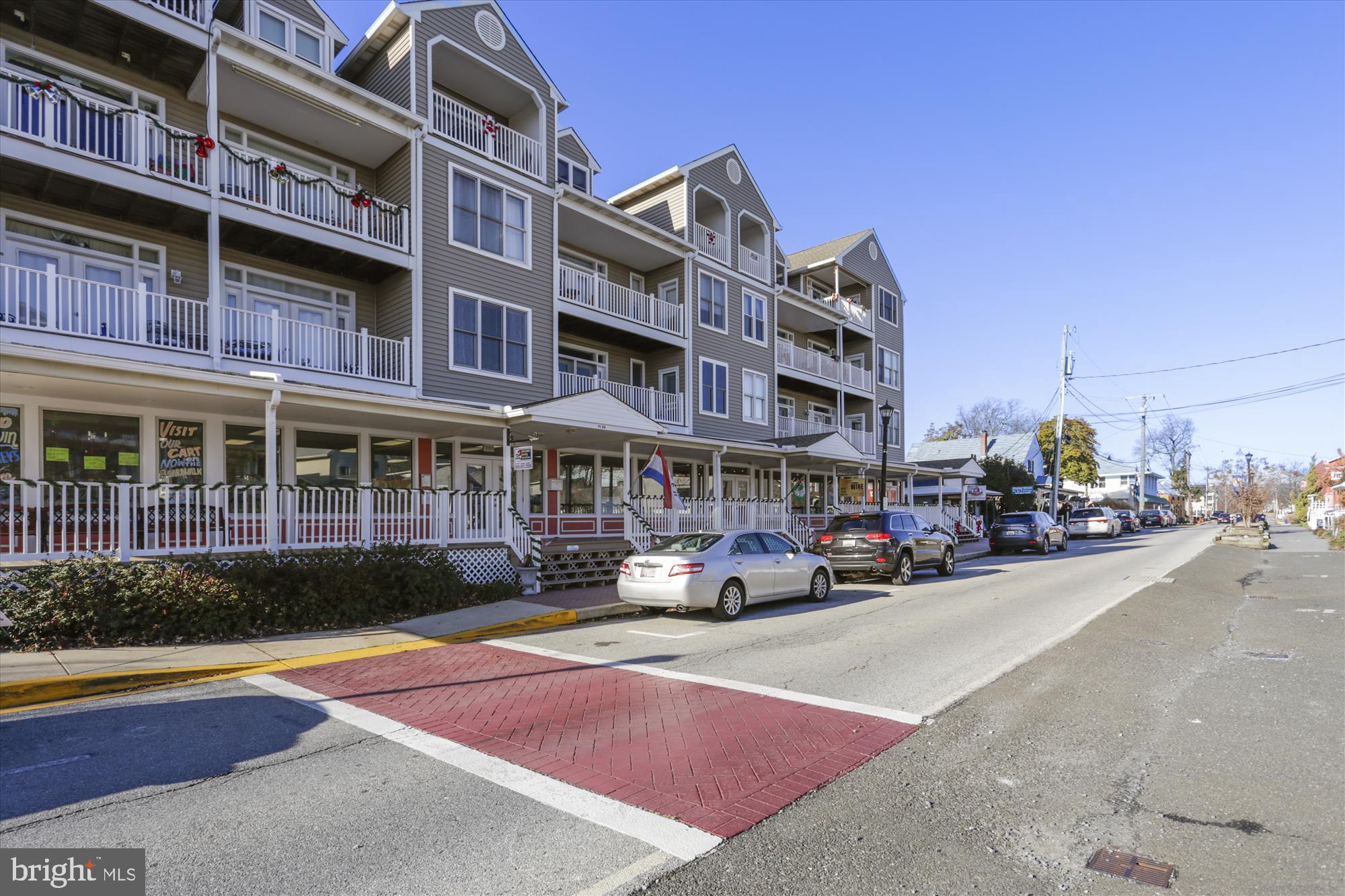 3831 8th Street North Beach, MD 20714 - Photo 29 of 37 a cars parked in front of a building