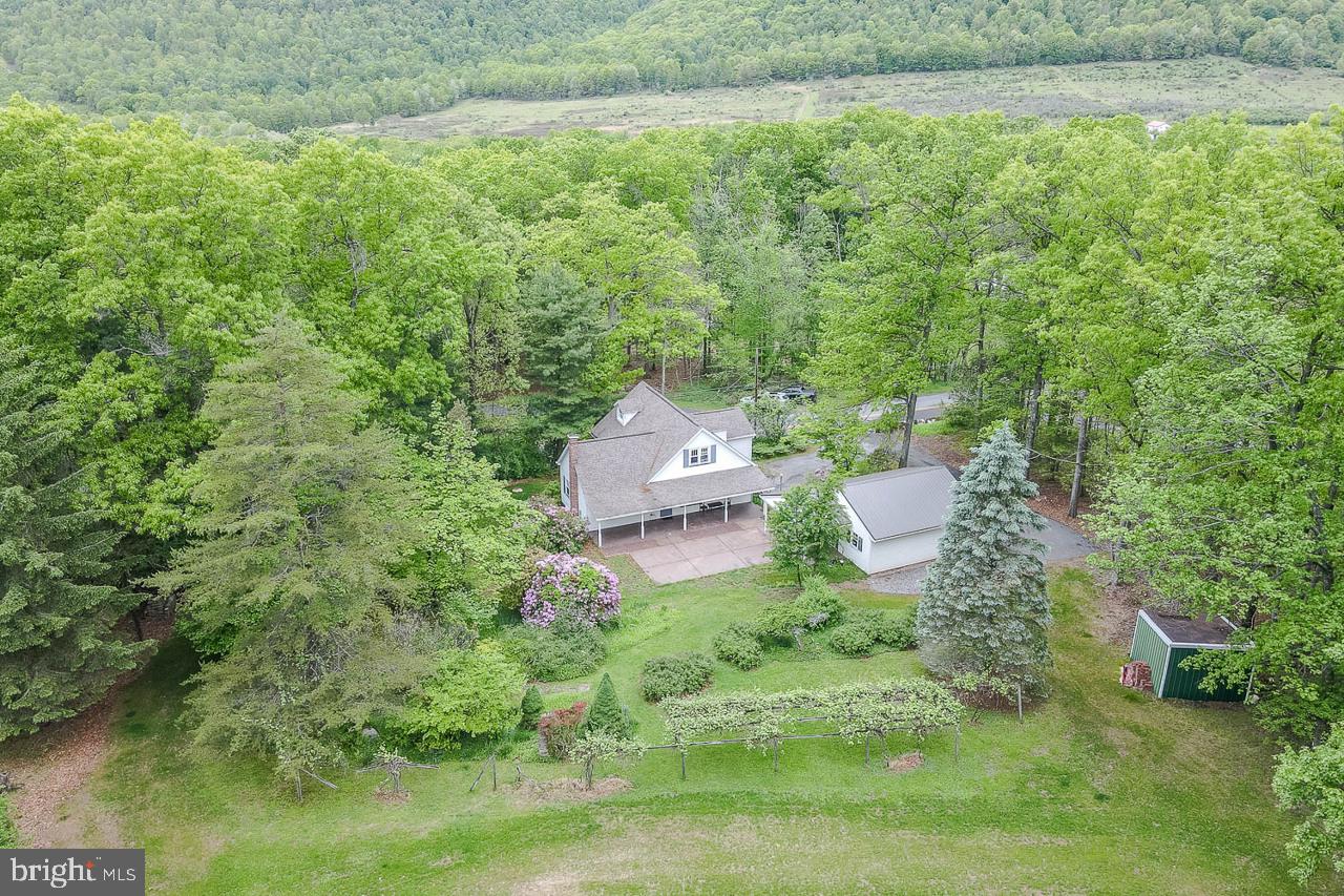 a view of a back yard from a balcony