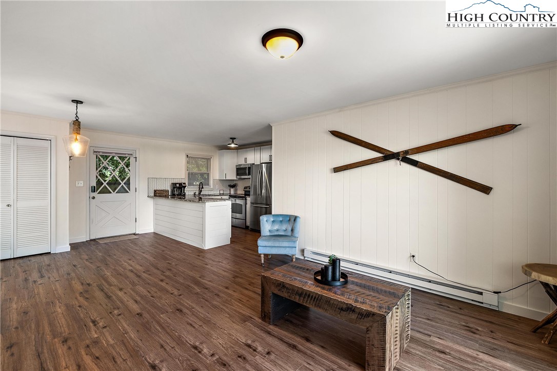 101 Mid Holiday Lane, Unit E217 Beech Mountain, NC 28604 - Photo 12 of 43 a workspace with furniture and window