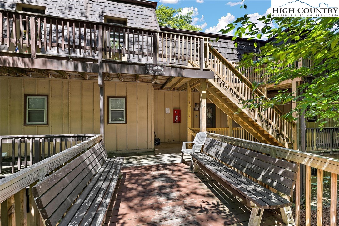 101 Mid Holiday Lane, Unit E217 Beech Mountain, NC 28604 - Photo 2 of 43 a view of a house with a balcony