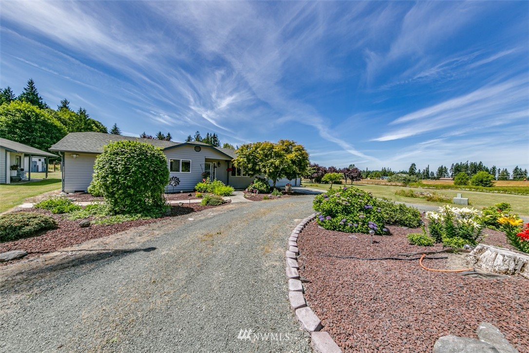 422 Hulse Road Port Angeles, WA 98362 - Photo 30 of 40 a front view of a house having a yard