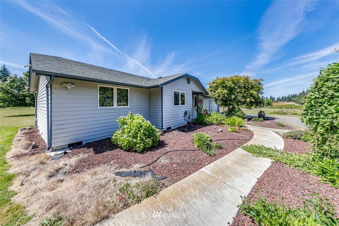 422 Hulse Road Port Angeles, WA 98362 - Photo 31 of 40 a front view of a house with garden