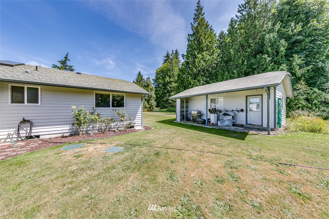 422 Hulse Road Port Angeles, WA 98362 - Photo 33 of 40 a front view of a house with garden
