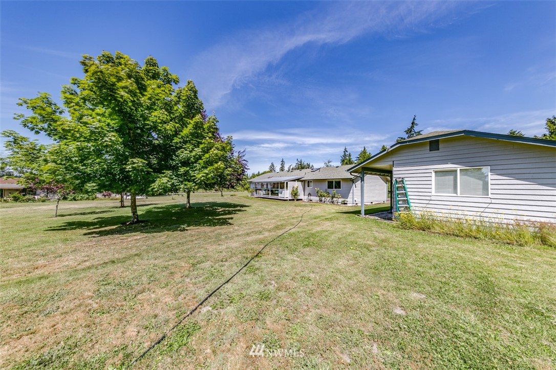 422 Hulse Road Port Angeles, WA 98362 - Photo 35 of 40 a front view of a house with a yard