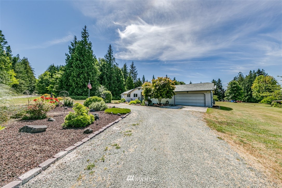 422 Hulse Road Port Angeles, WA 98362 - Photo 40 of 40 a front view of a house with a yard