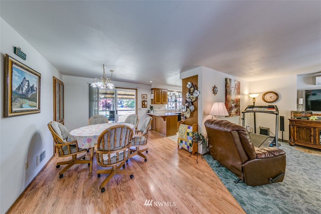 422 Hulse Road Port Angeles, WA 98362 - Photo 7 of 40 a living room with furniture and a wooden floor