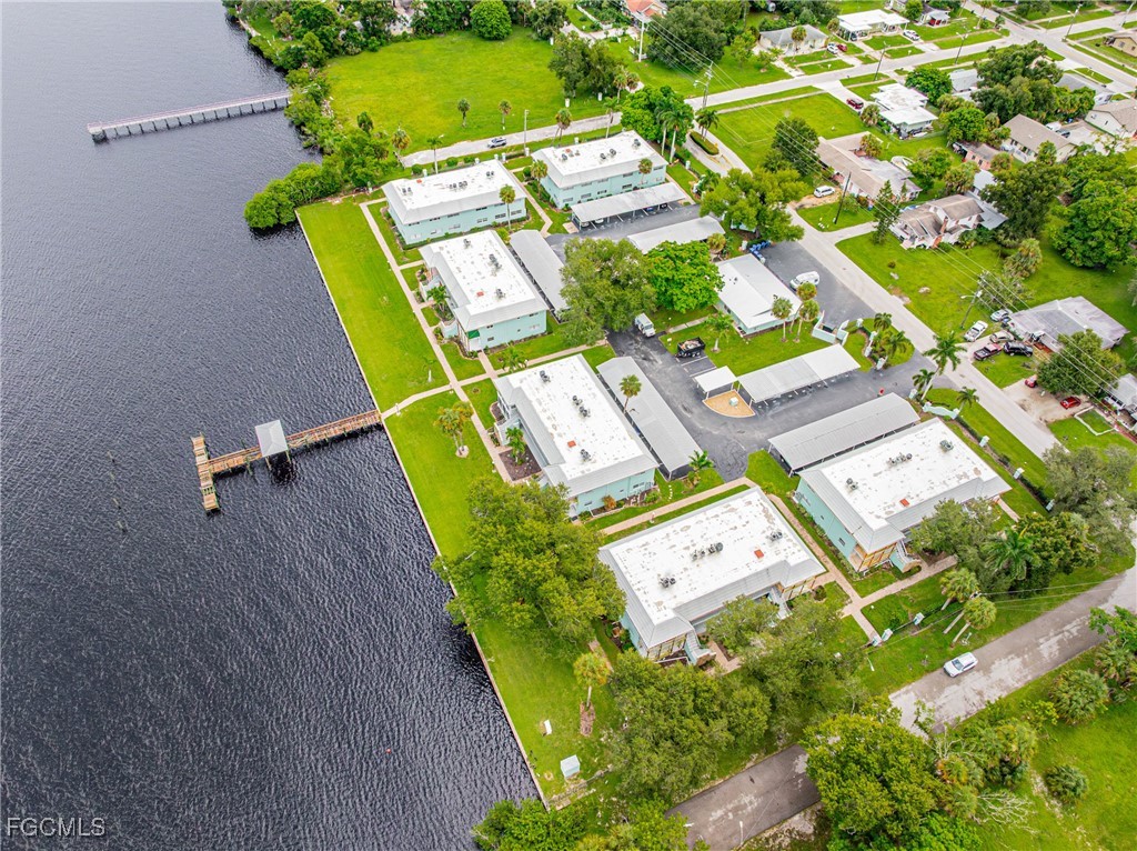 3225 East Riverside Drive, Unit 34C Fort Myers, FL 33916 - Photo 50 of 50 an aerial view of a residential houses with outdoor space