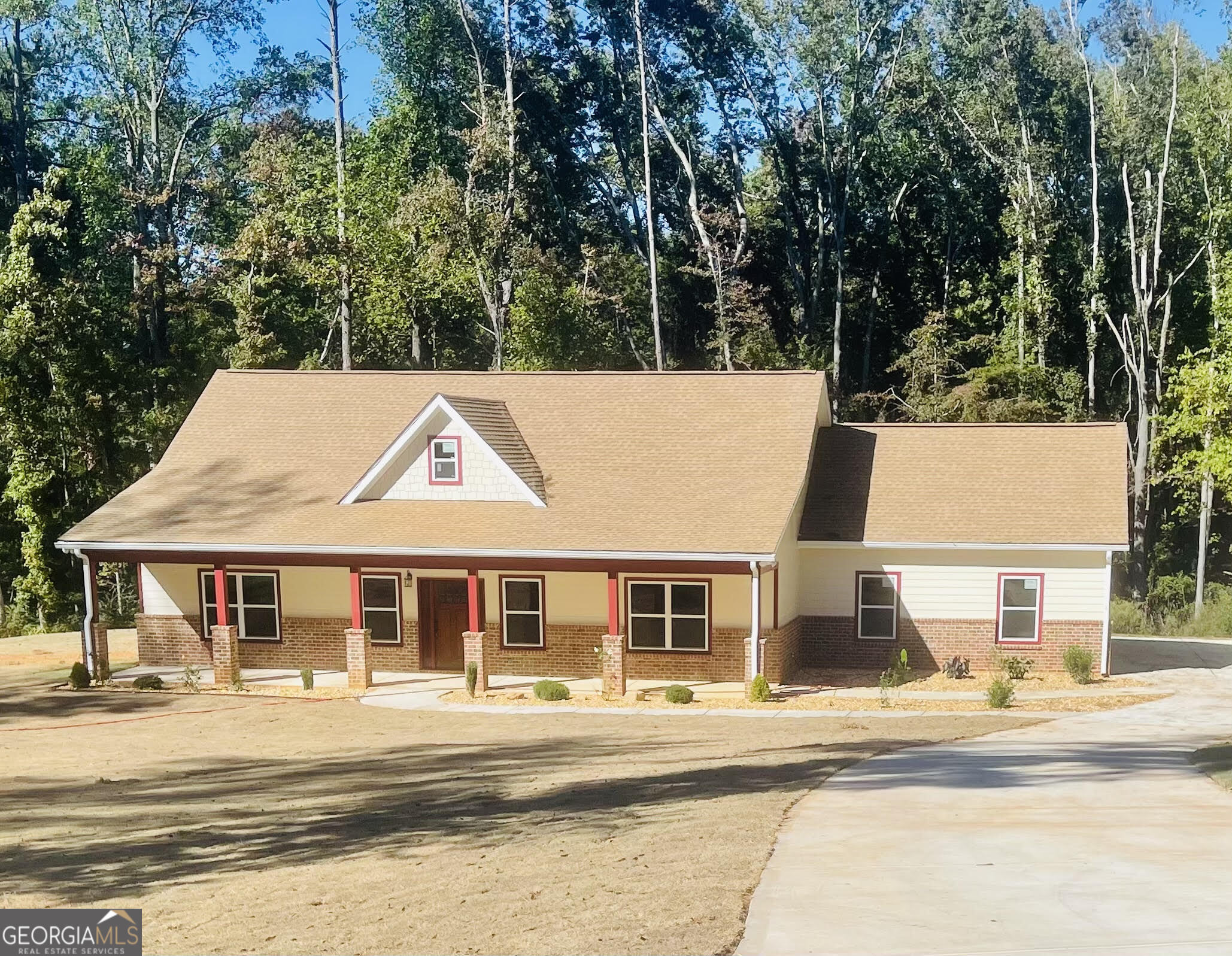 1663 Piedmont Road Griffin, GA 30224 - Photo 1 of 1 front view of a house with a yard
