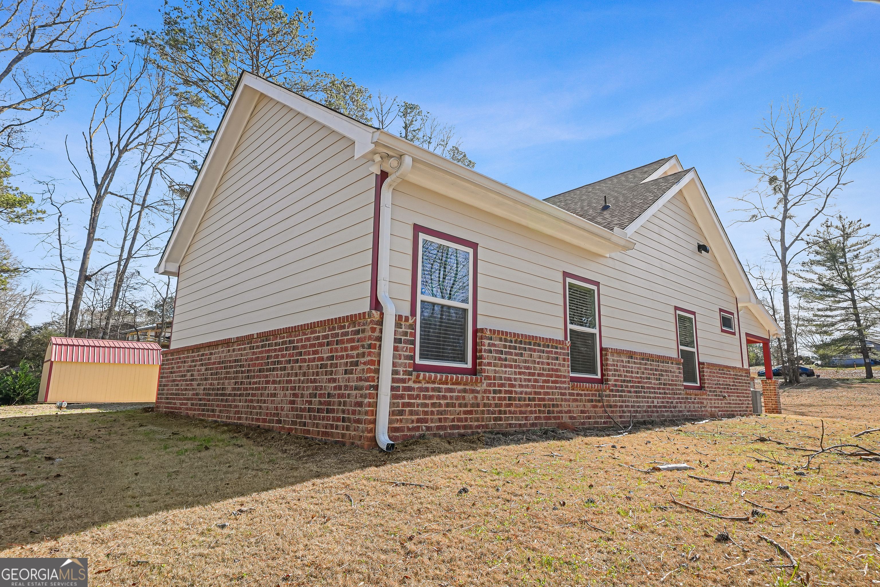 1663 Piedmont Road Griffin, GA 30224 - Photo 27 of 35 a view of a house with a yard