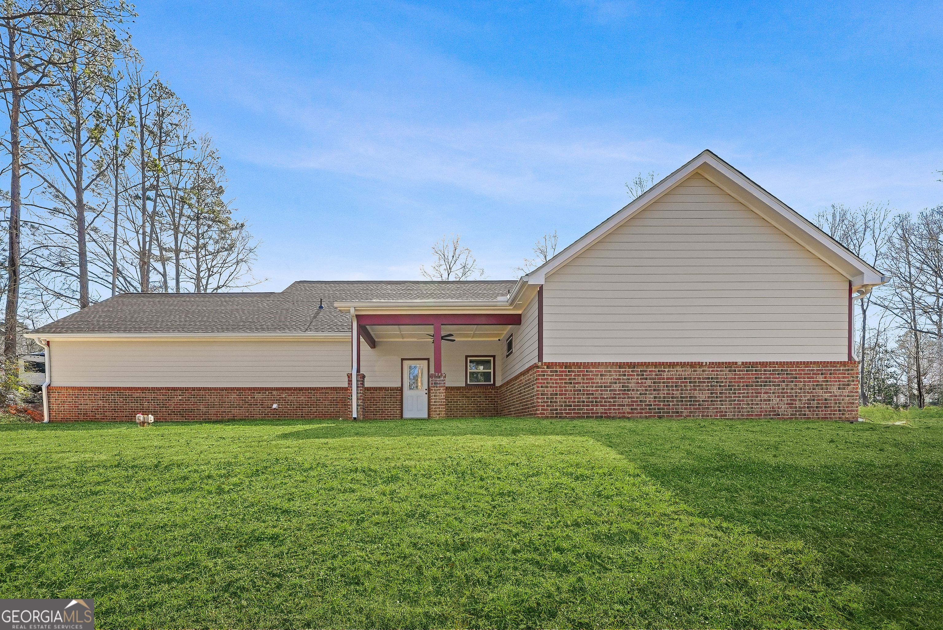 1663 Piedmont Road Griffin, GA 30224 - Photo 31 of 35 a front view of house with yard and green space