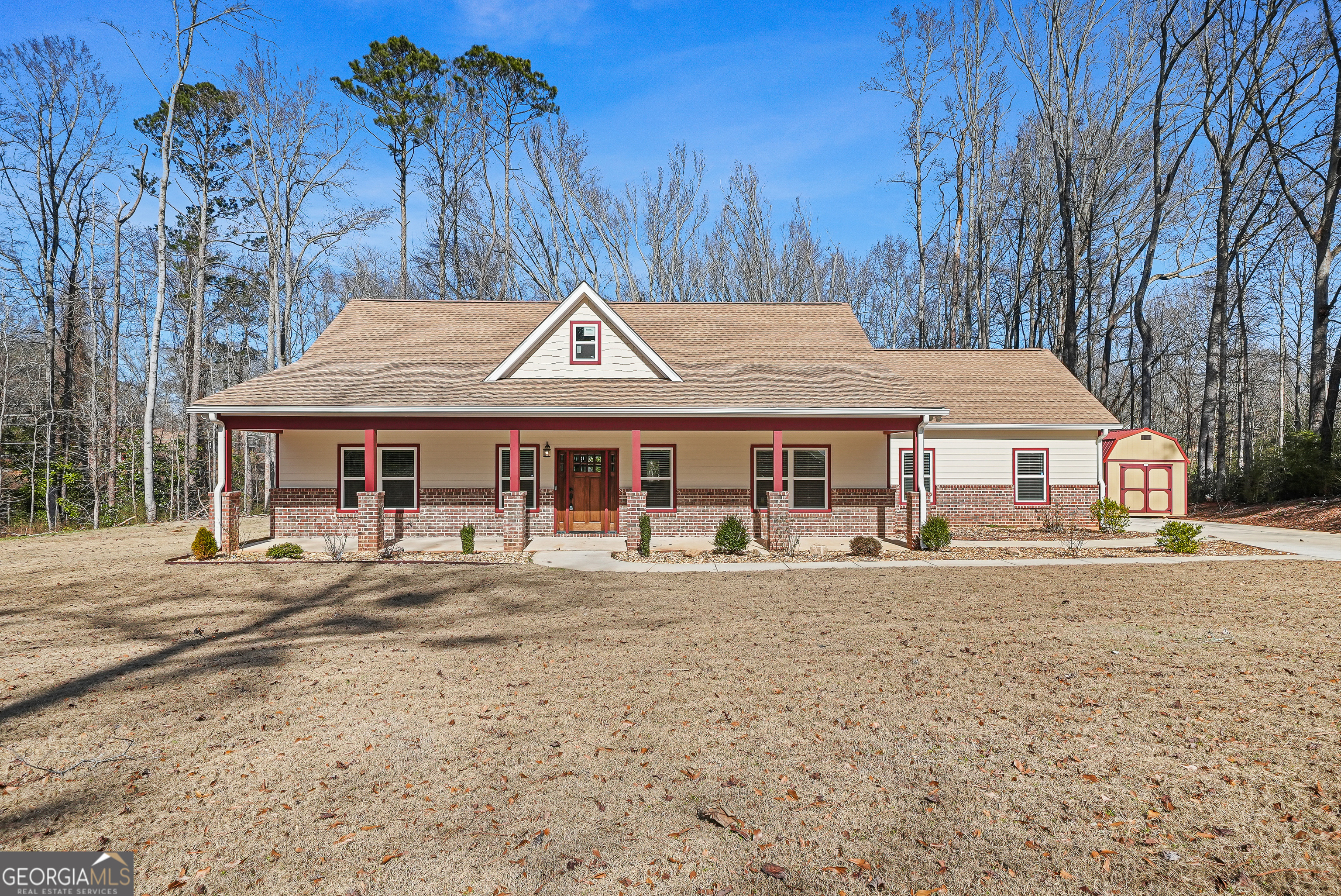 1663 Piedmont Road Griffin, GA 30224 - Photo 4 of 35 a front view of a house with a yard