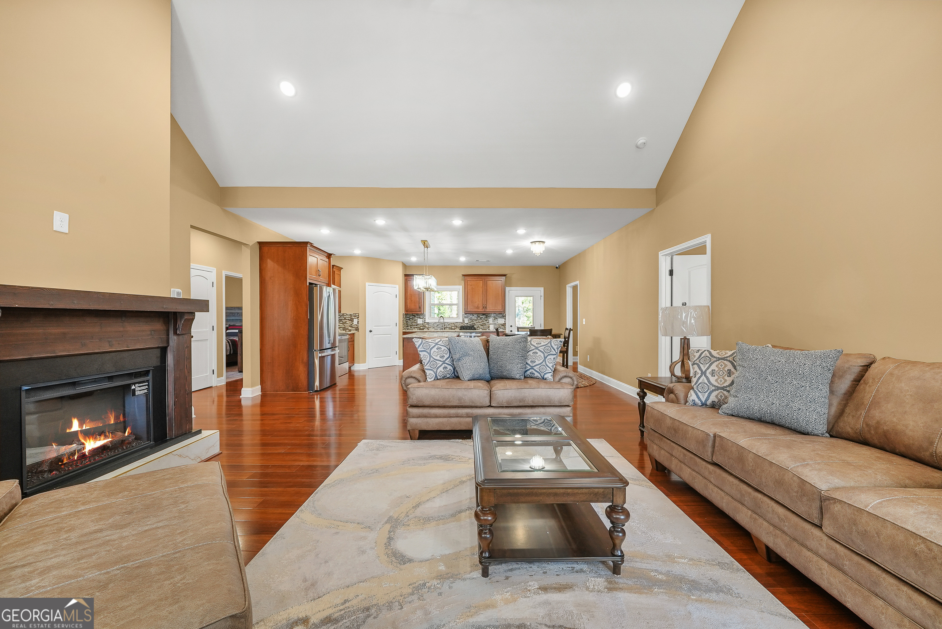 1663 Piedmont Road Griffin, GA 30224 - Photo 7 of 35 a living room with furniture and a fireplace