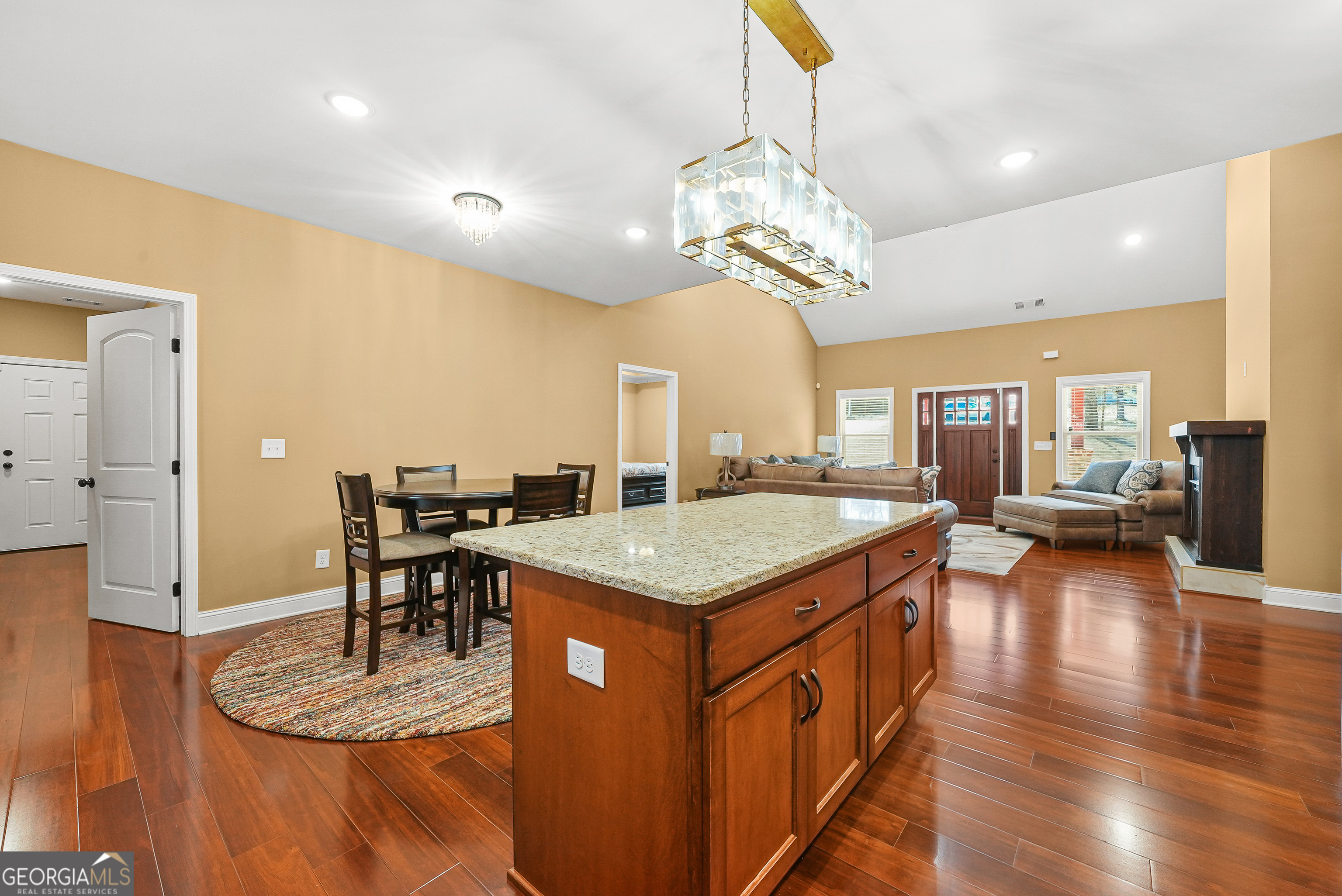 1663 Piedmont Road Griffin, GA 30224 - Photo 8 of 35 a kitchen with a table and chairs in it