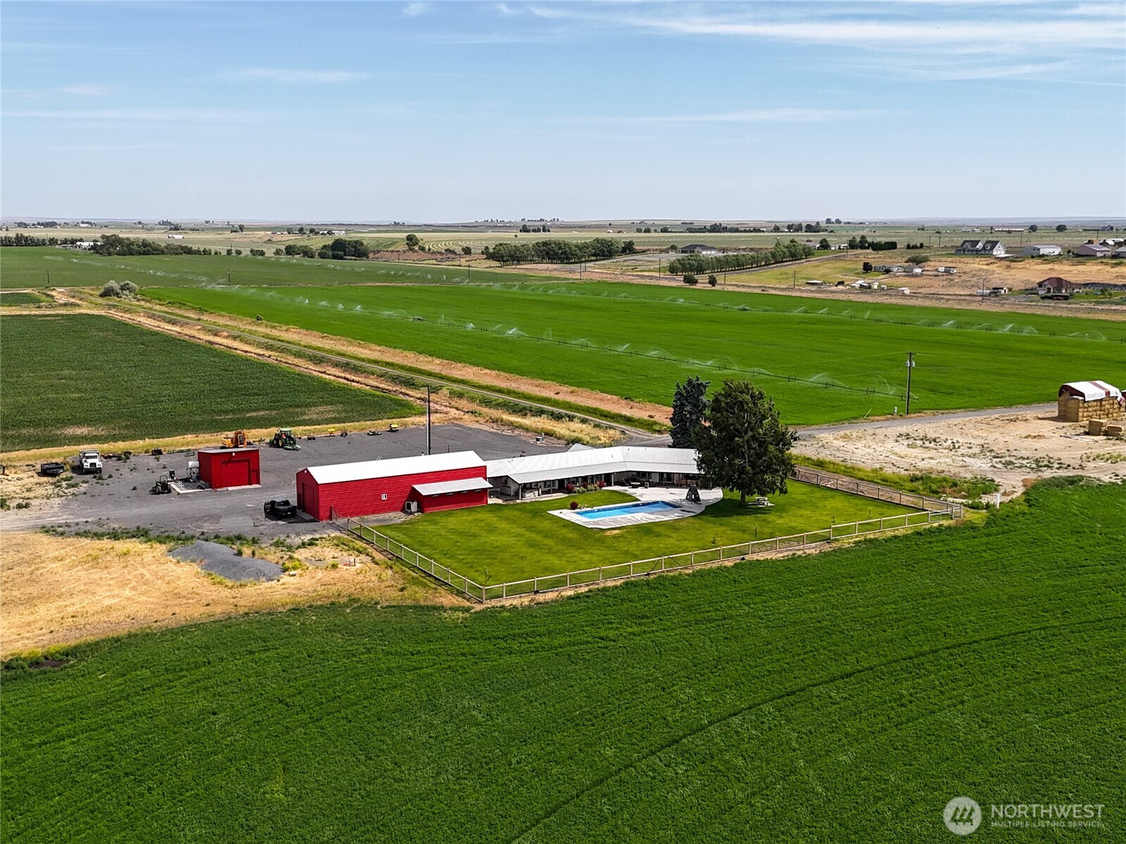 8708 Rd K Northeast Moses Lake, WA 98837 - Photo 7 of 40 a view of a field with grass and plants