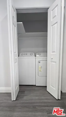 a hallway with wooden floor