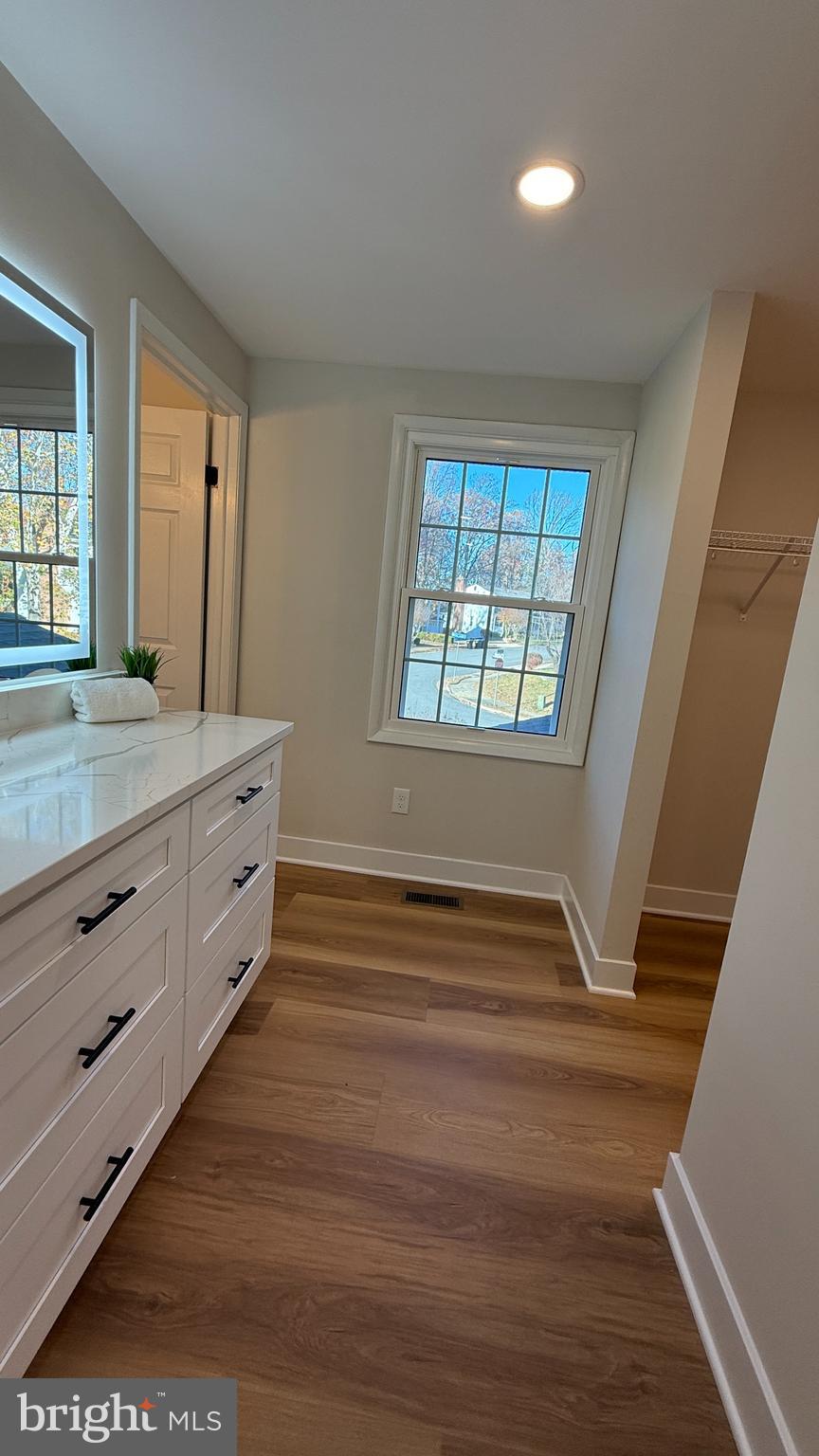 8375 Magic Leaf Road Springfield, VA 22153 - Photo 21 of 43 a bathroom with a sink and a bathtub