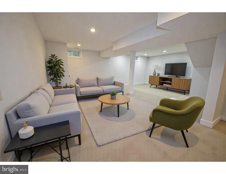 8375 Magic Leaf Road Springfield, VA 22153 - Photo 31 of 43 a living room with furniture and a rug