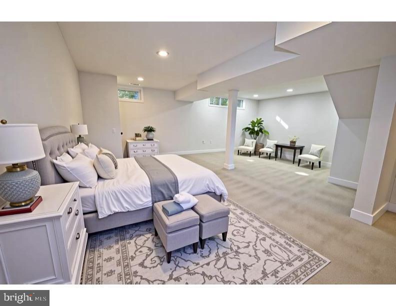 8375 Magic Leaf Road Springfield, VA 22153 - Photo 32 of 43 a living room with furniture and a table