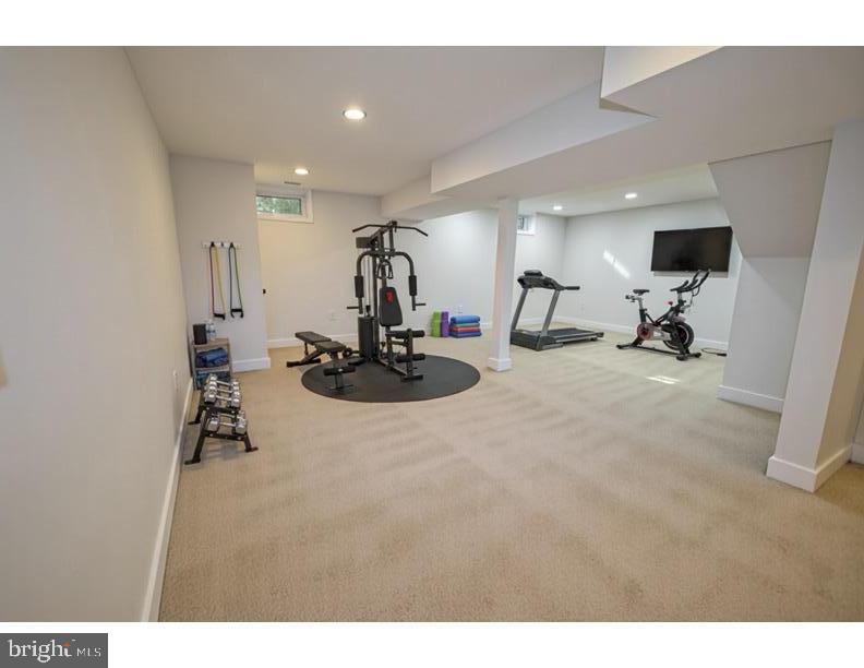 8375 Magic Leaf Road Springfield, VA 22153 - Photo 34 of 43 a view of a room with gym equipment