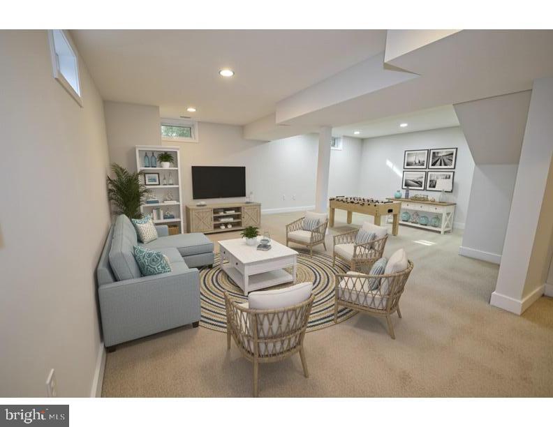 8375 Magic Leaf Road Springfield, VA 22153 - Photo 39 of 43 a living room with furniture and a flat screen tv