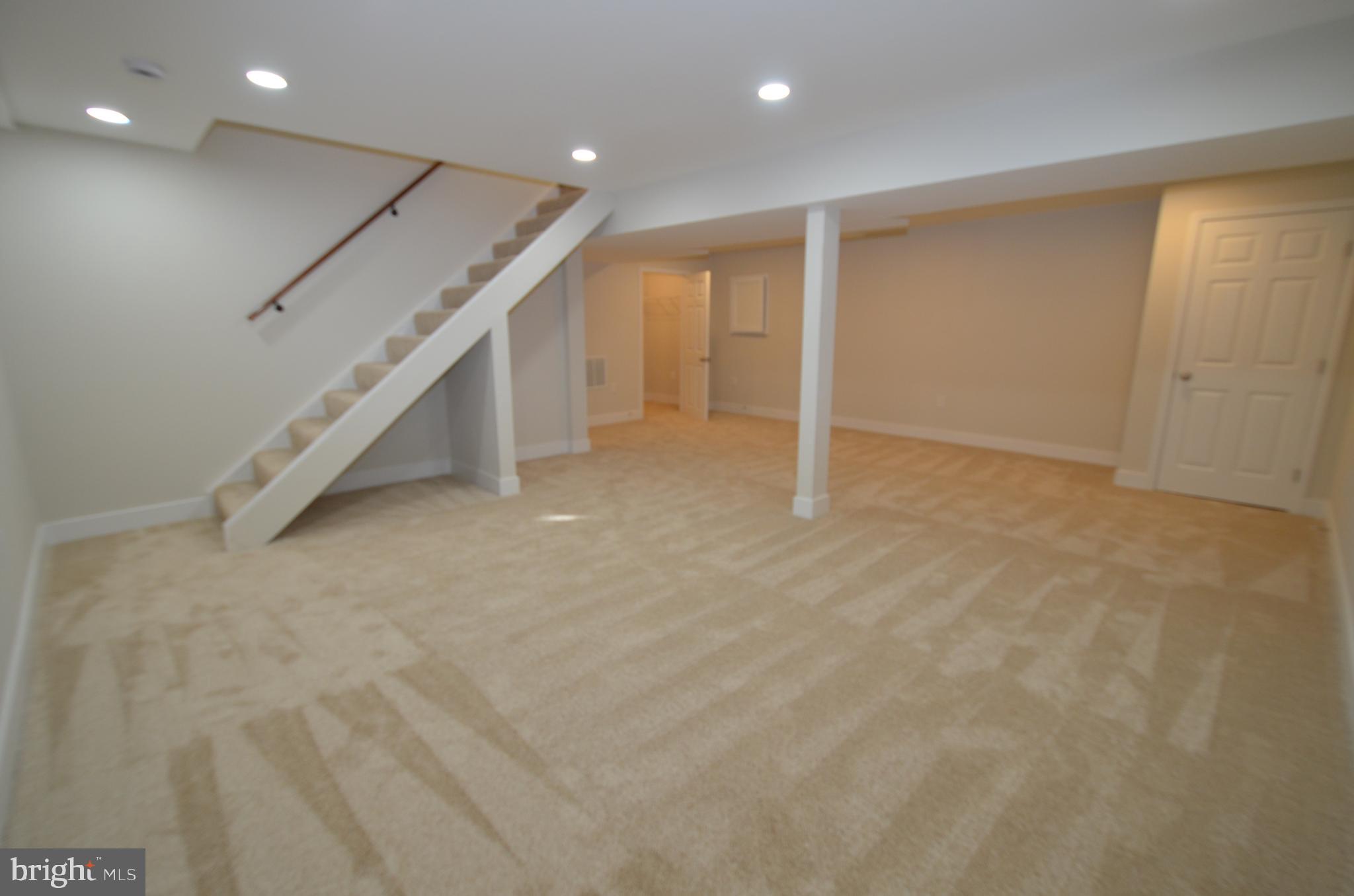8375 Magic Leaf Road Springfield, VA 22153 - Photo 40 of 43 an empty room with an entryway